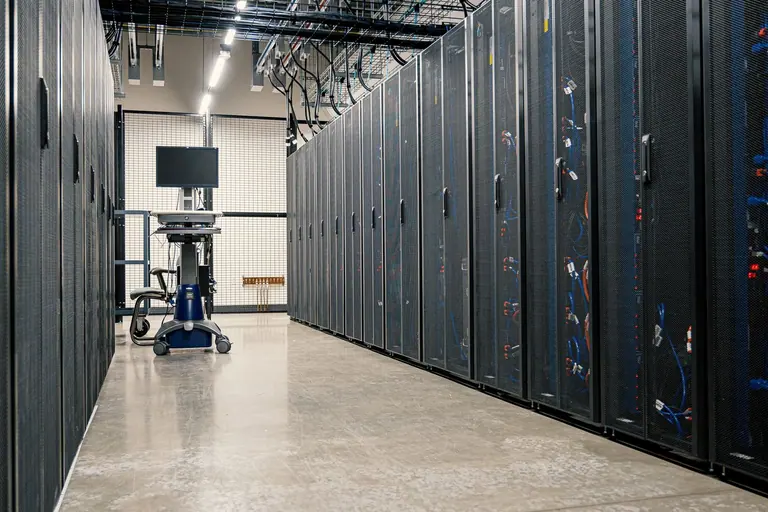 Rows of server racks inside a data centre